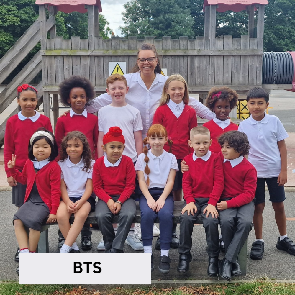 group of children in a school playground in a class photo